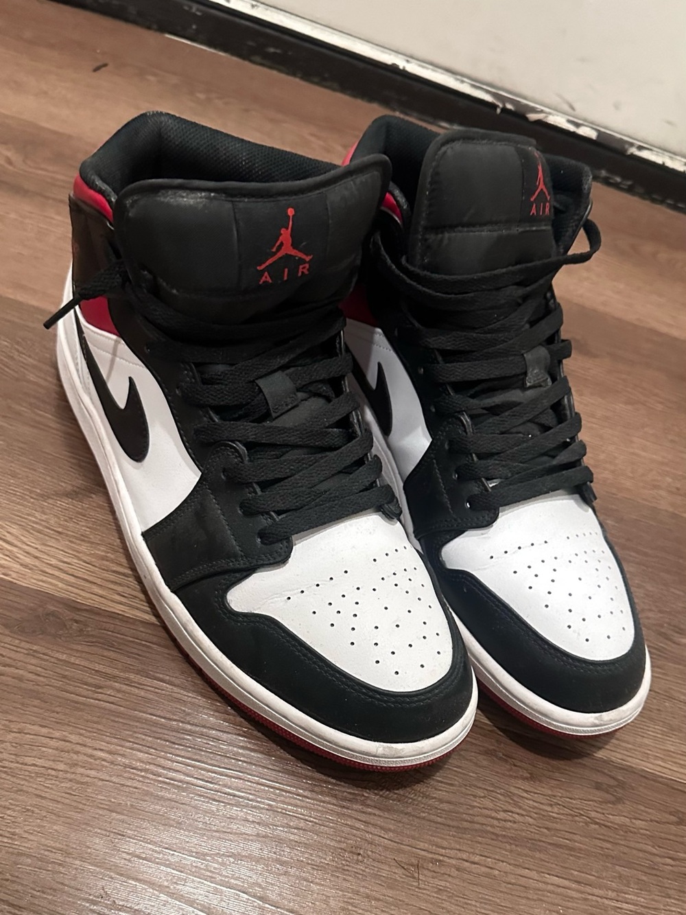 Jordan 1 Mid Black/White/Red Retro Sneakers